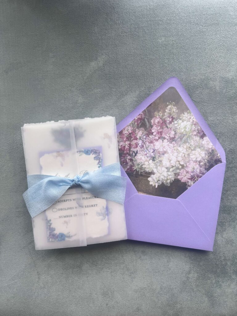 Purple wedding invitation suite with fine art floral envelope liner