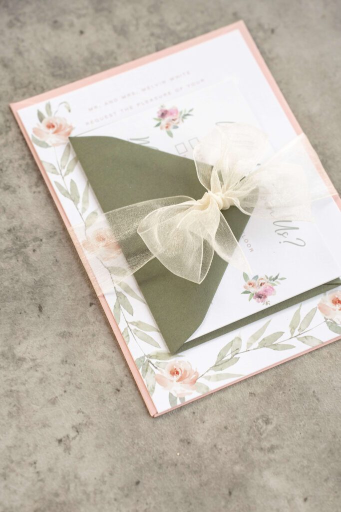 Peach and green wedding invitation suite with rustic watercolor florals