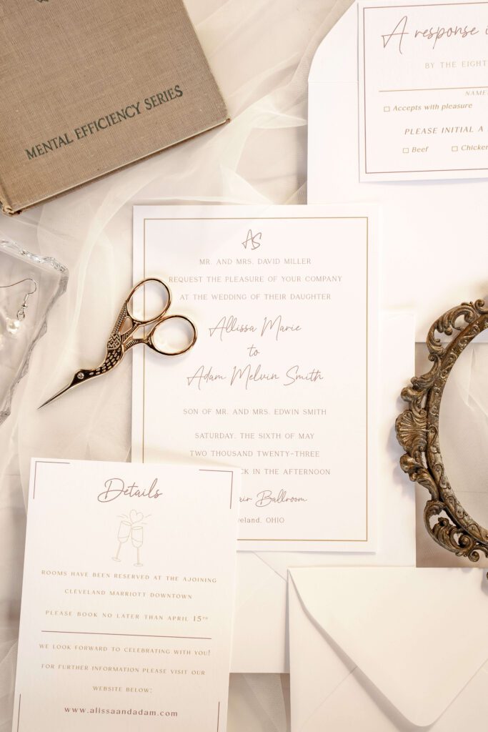 Simple, classic wedding invitation suite featuring neutral colors