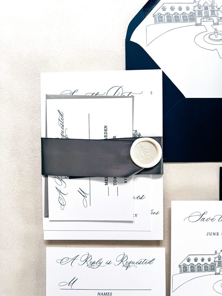 Wedding invitation suite embellished with silk ribbon belly band
