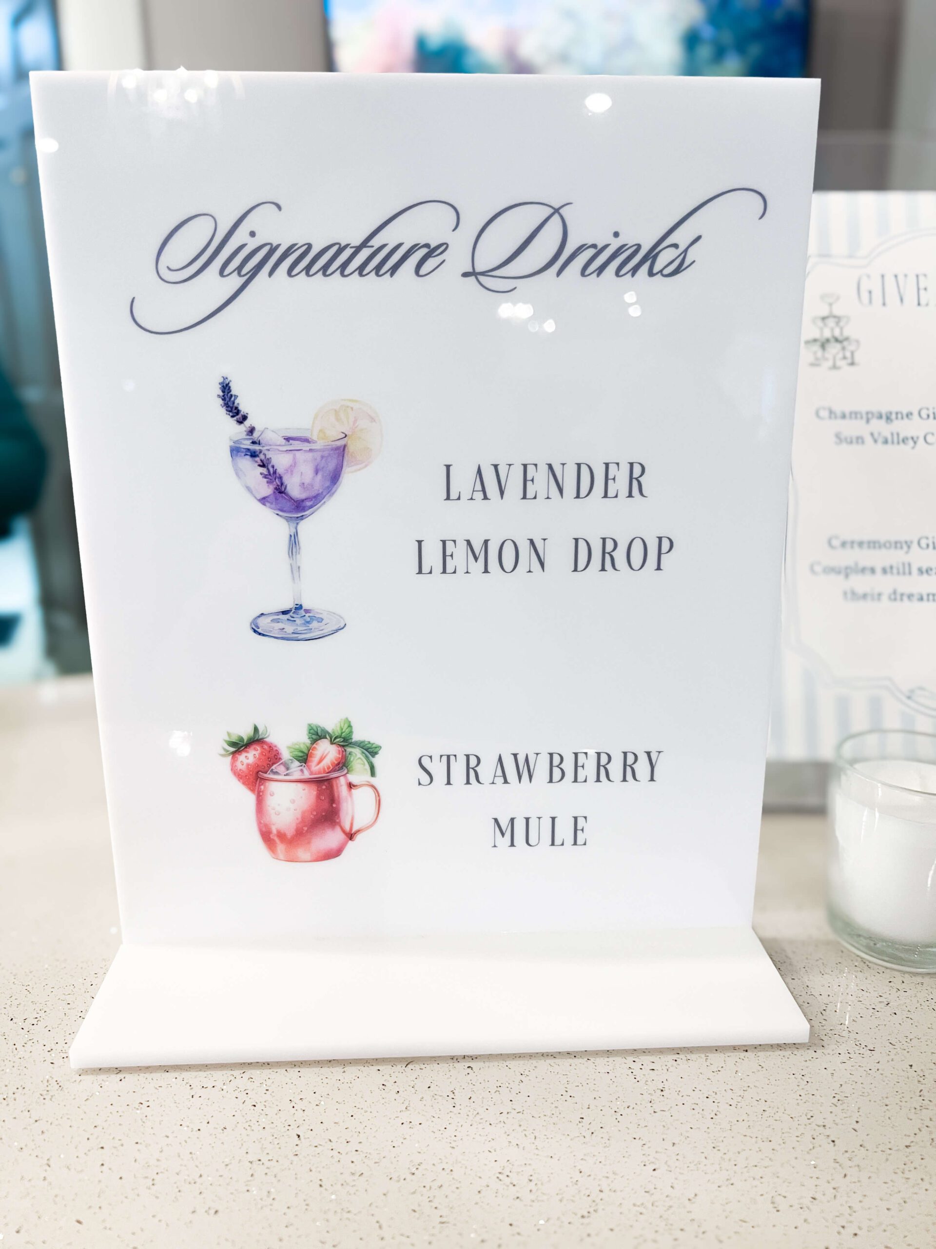 Signature drink sign featuring lavender lemon drop and strawberry mule watercolor art