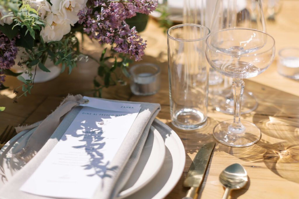 Tablescape featuring linen napkins and neutral menus