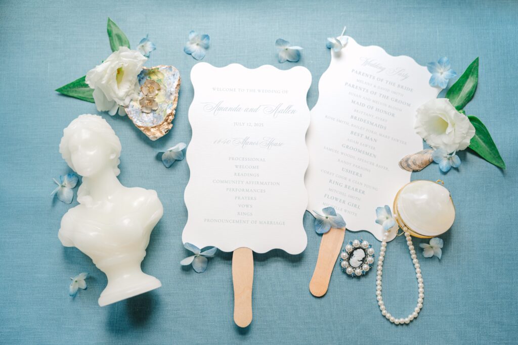 Wedding program fan with a scalloped edge