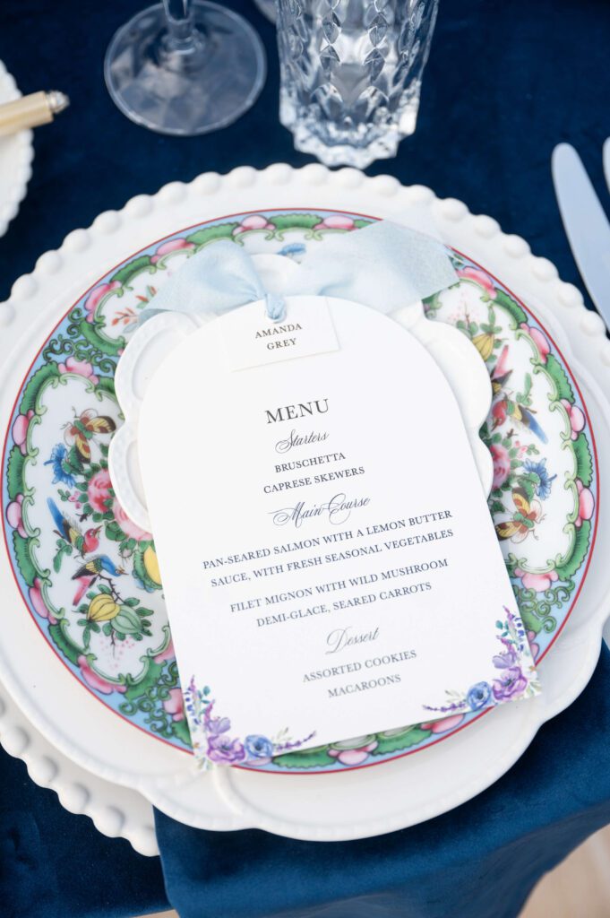 Elegant floral wedding day menu that doubles as a place card