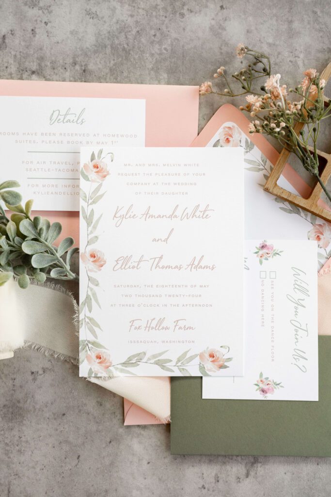 Romantic peach and green wedding invitation suite with watercolor florals