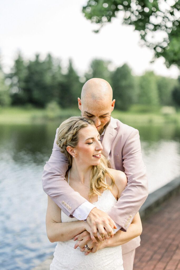 Bride and groom embracing on their wedding day in Chagrin Falls