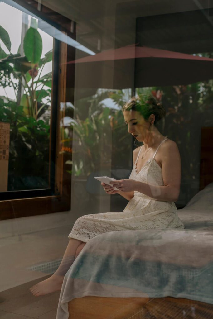 Bride privately reading her wedding vows on the morning of her Costa Rica elopement