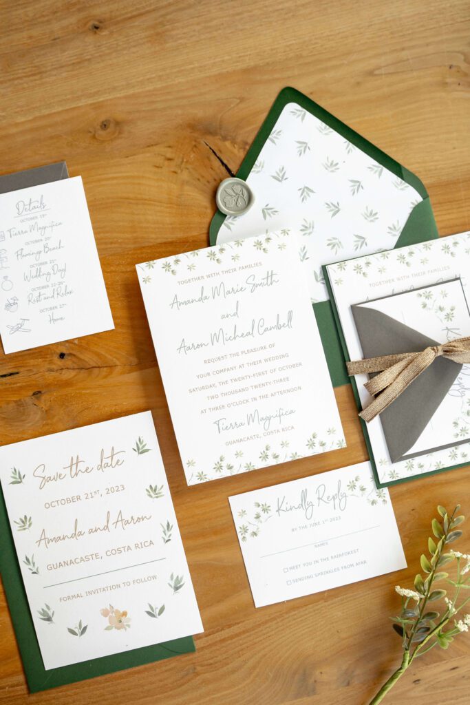 Costa Rica destination wedding save the date with watercolor greenery and green envelope