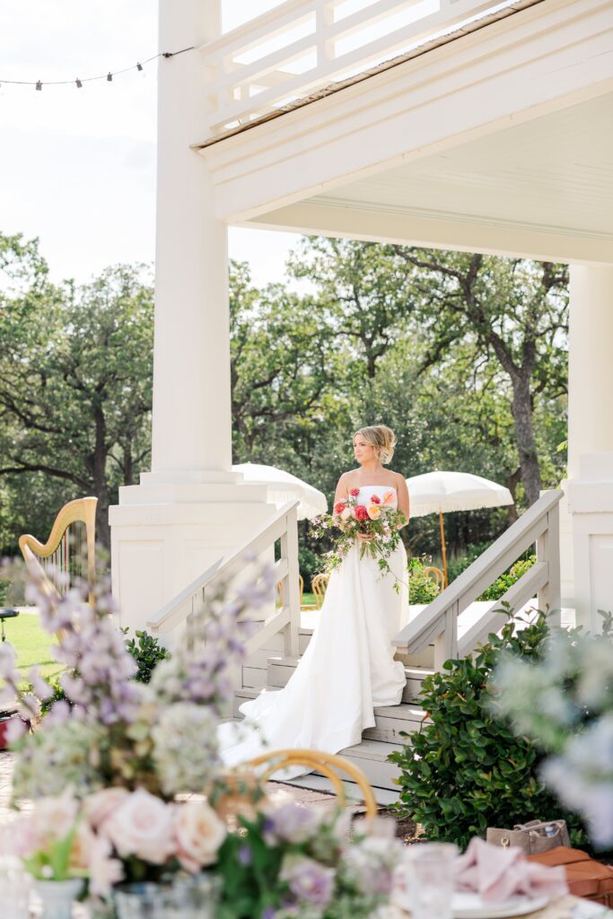 Bride standing on the steps of The Grand Lady