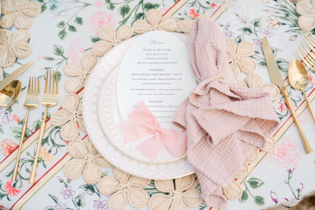 Elegant and romantic die-cut wedding invitation card with a pink bow