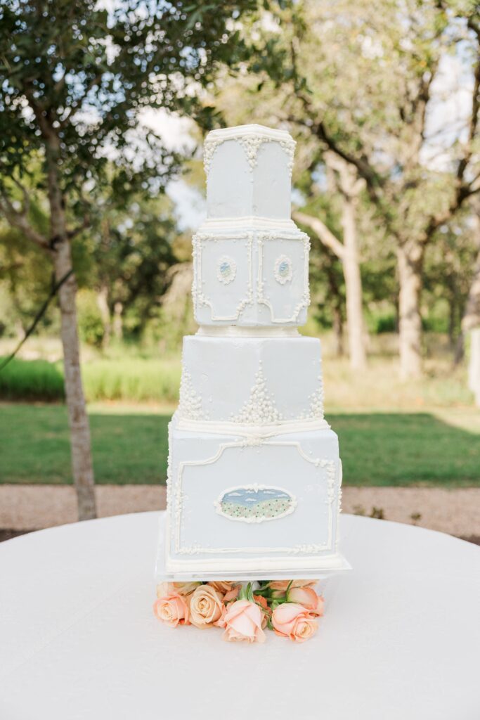 Four-tier vintage cake in light blue