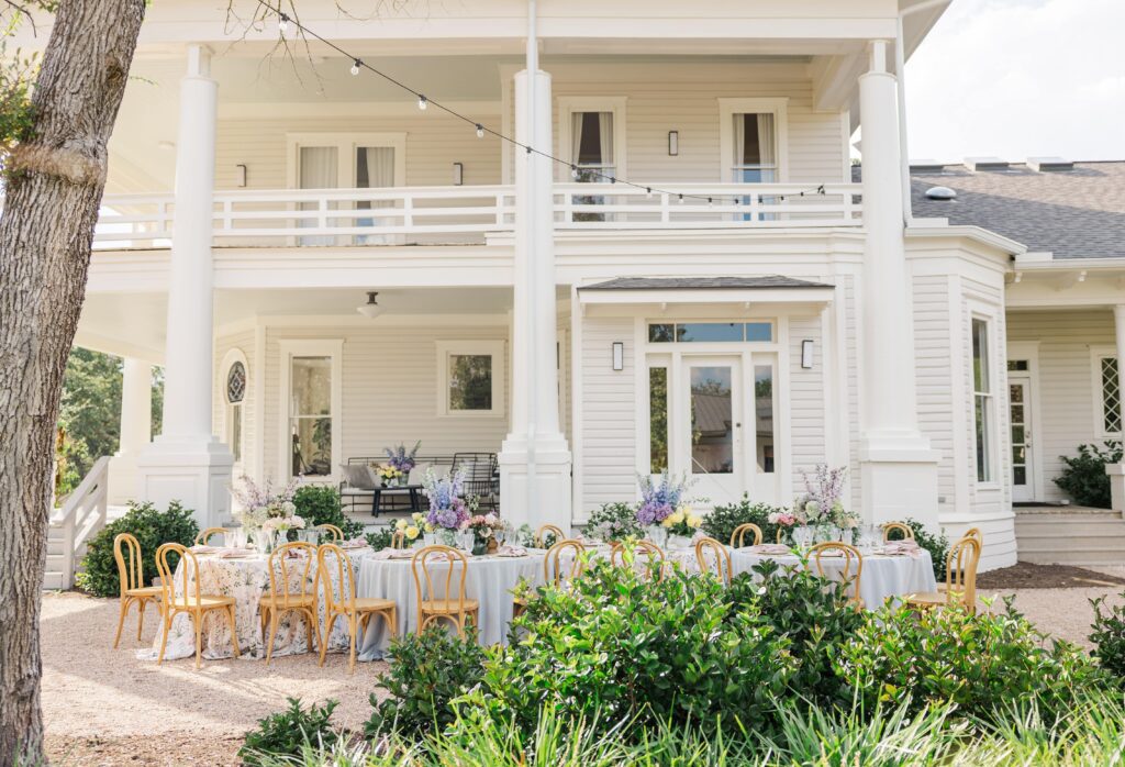 Elegant al fresco dining tables for a wedding reception