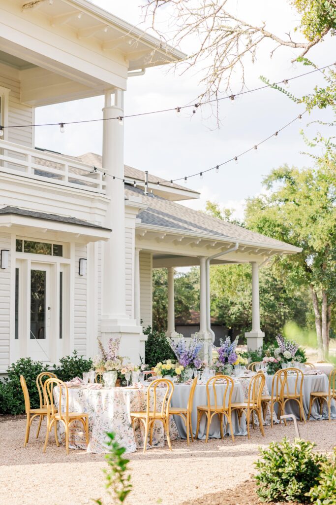 Elegant al fresco dining tables for a wedding reception