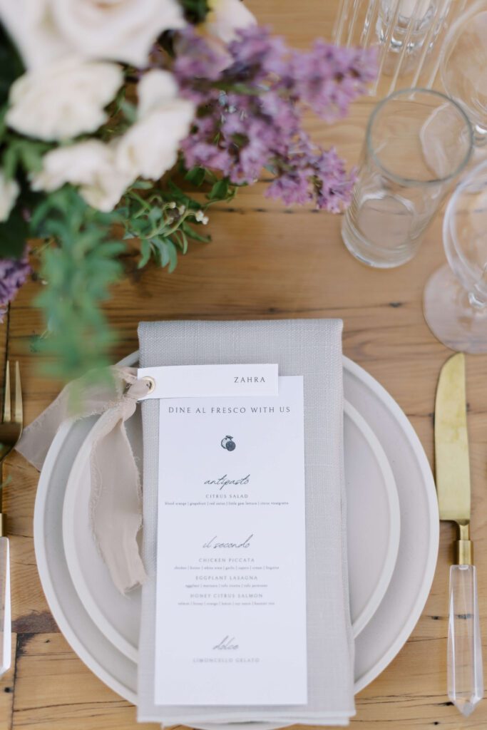 Wedding reception table with simple wedding menu card and name card
