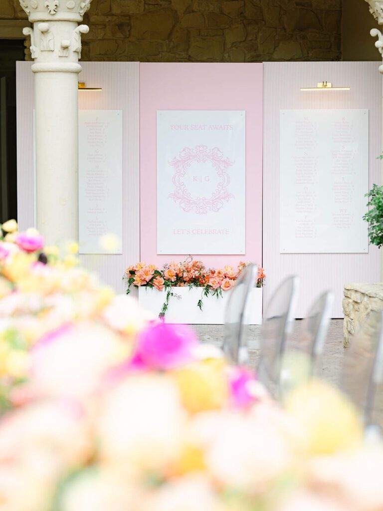 Large wedding seating chart with custom monogram and floral planter box