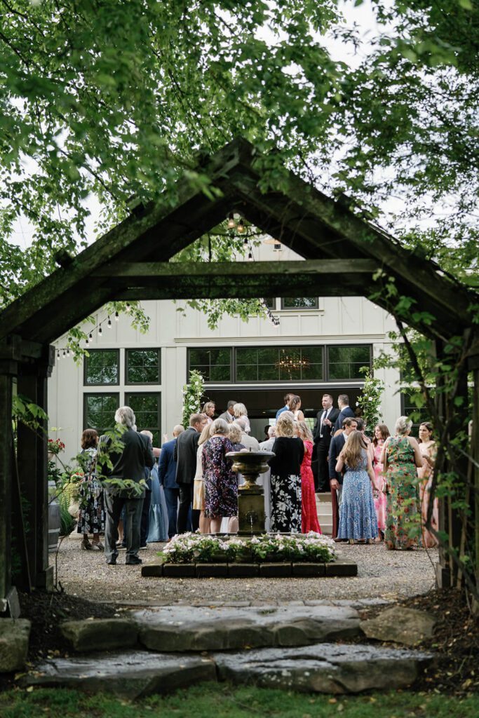 Guests enjoy cocktail hour at Northern Ohio wedding venue The Orchid House