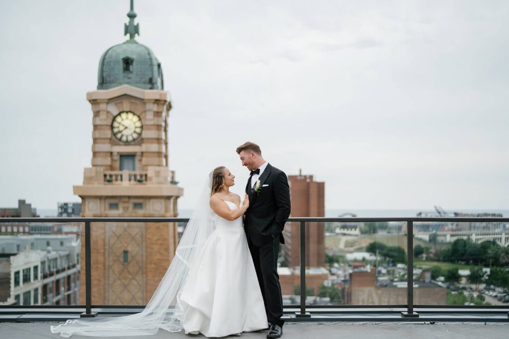 Bride and groom portrait overlooking the Cleveland skyline
