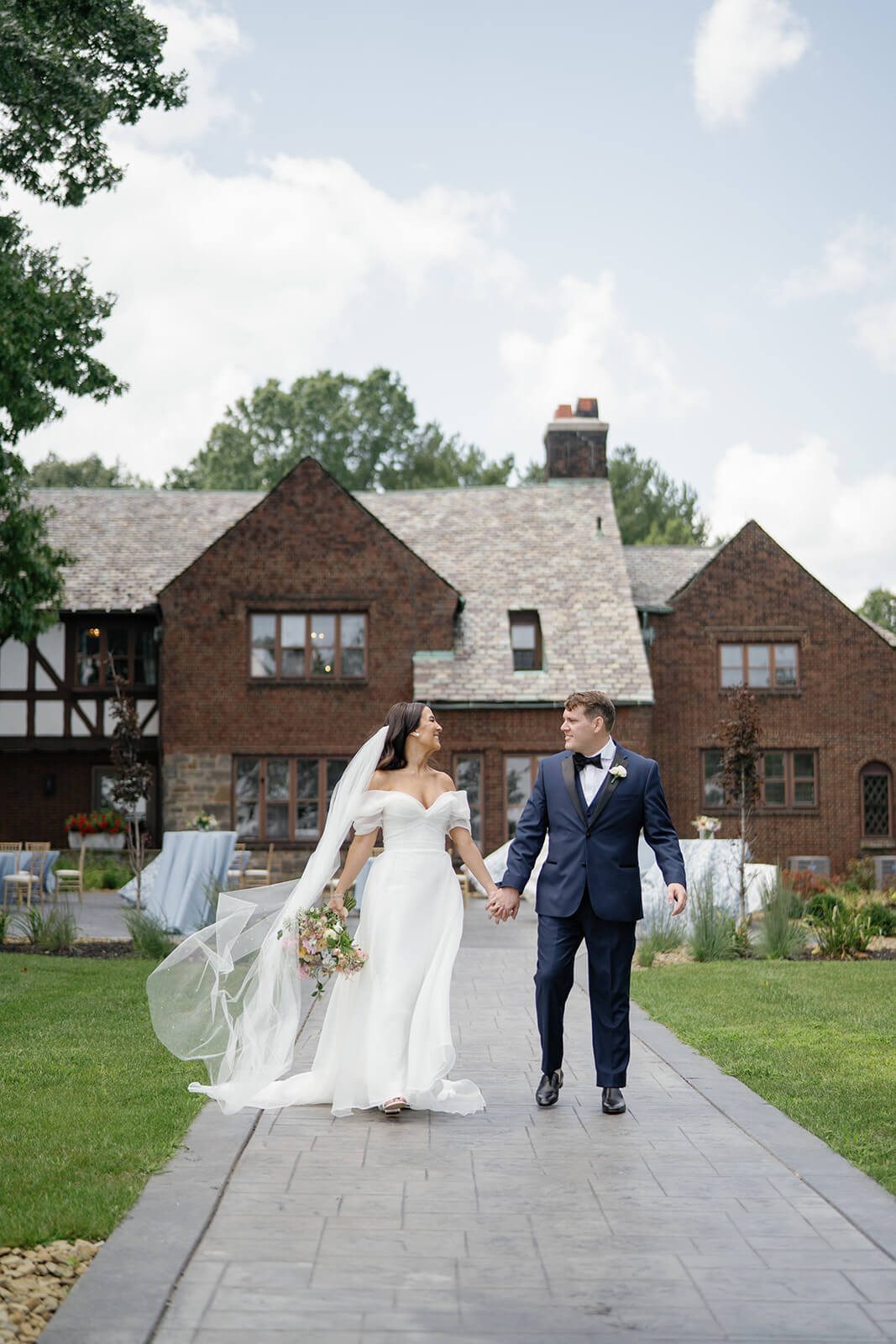 Bride and groom portrait outside of Tudor House, a Northeast Ohio wedding venue