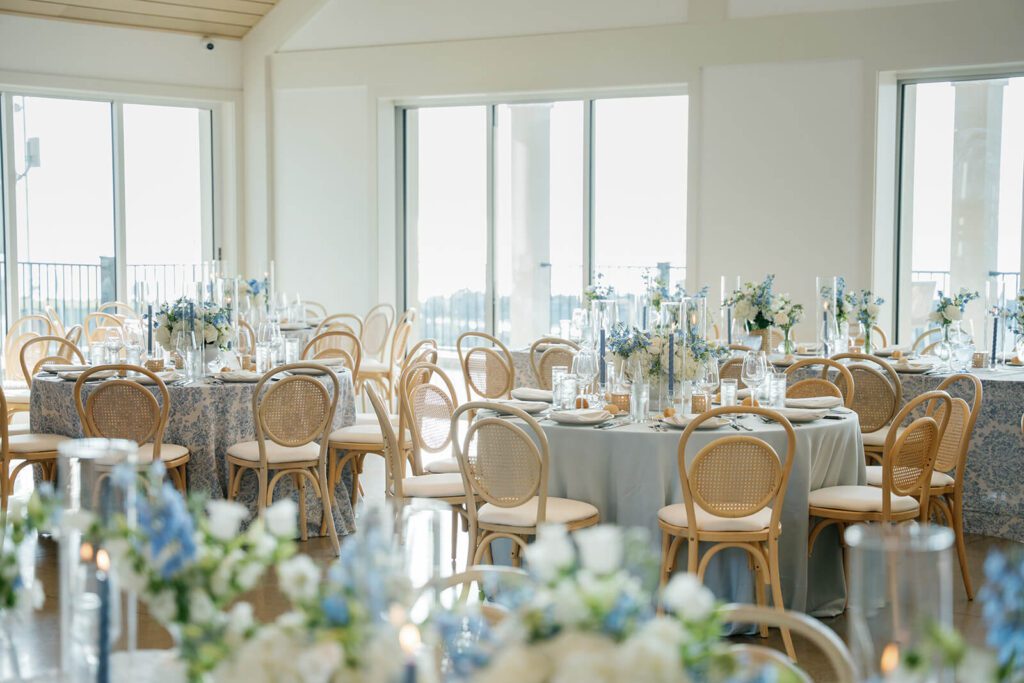 White and blue coastal wedding reception decor