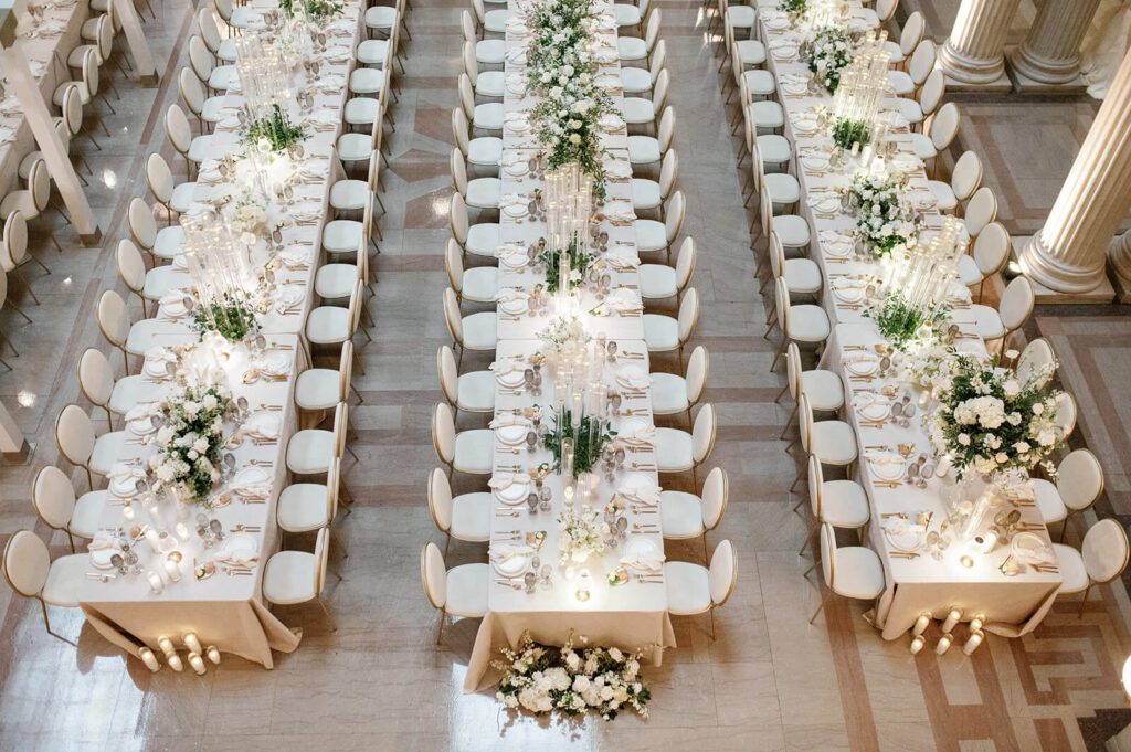 Luxury white wedding tables set up in The Old Courthouse in Cleveland, Ohio