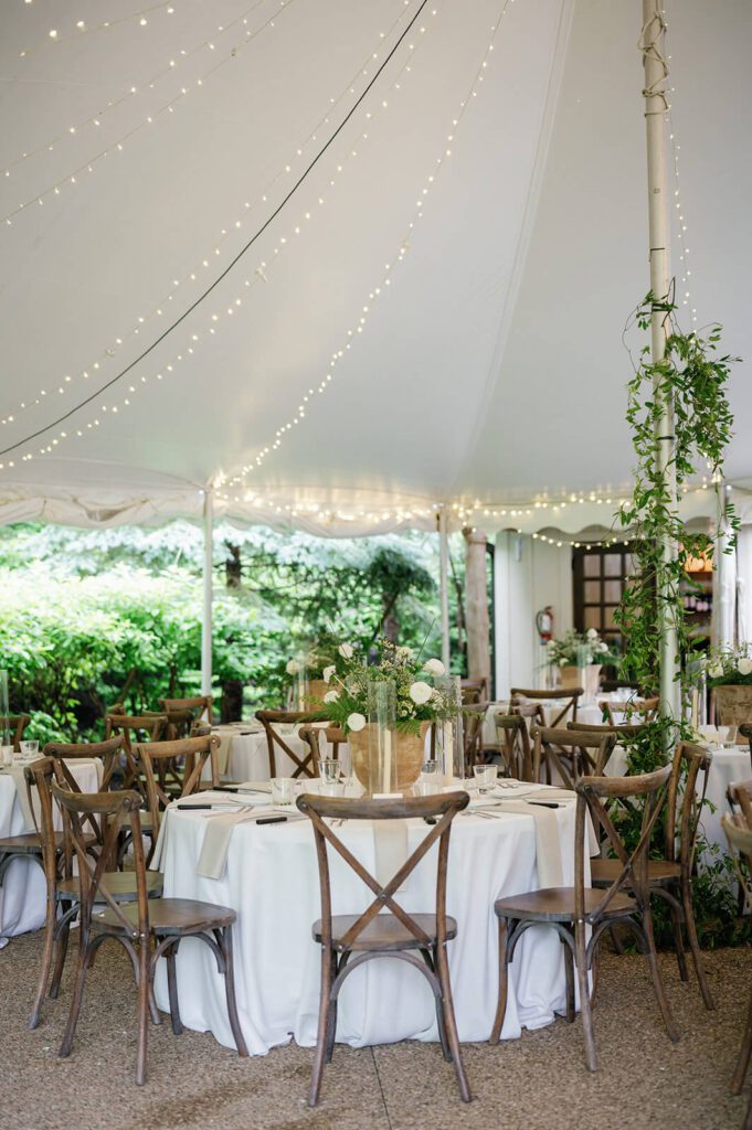 Elegant and rustic wedding reception tent on the grounds of Northern Ohio wedding venue The Orchid House