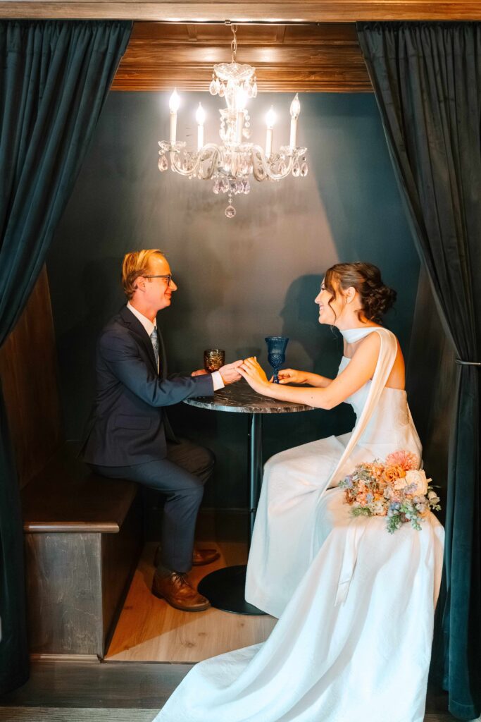 Bride and groom in the bourbon lounge at 1840 Manor House
