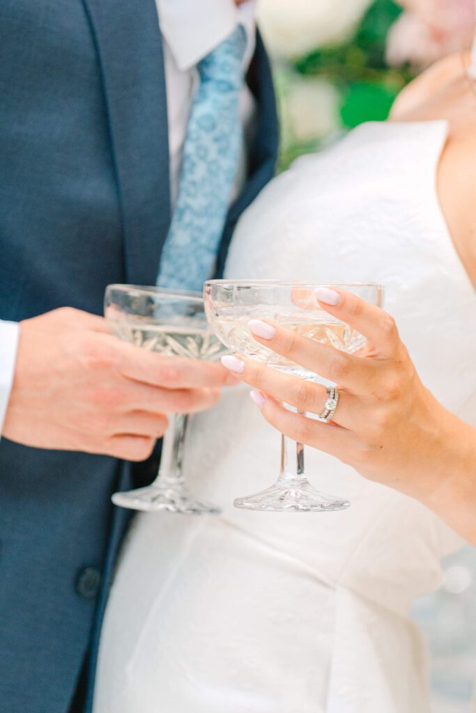 Bride and groom with champagne glasses