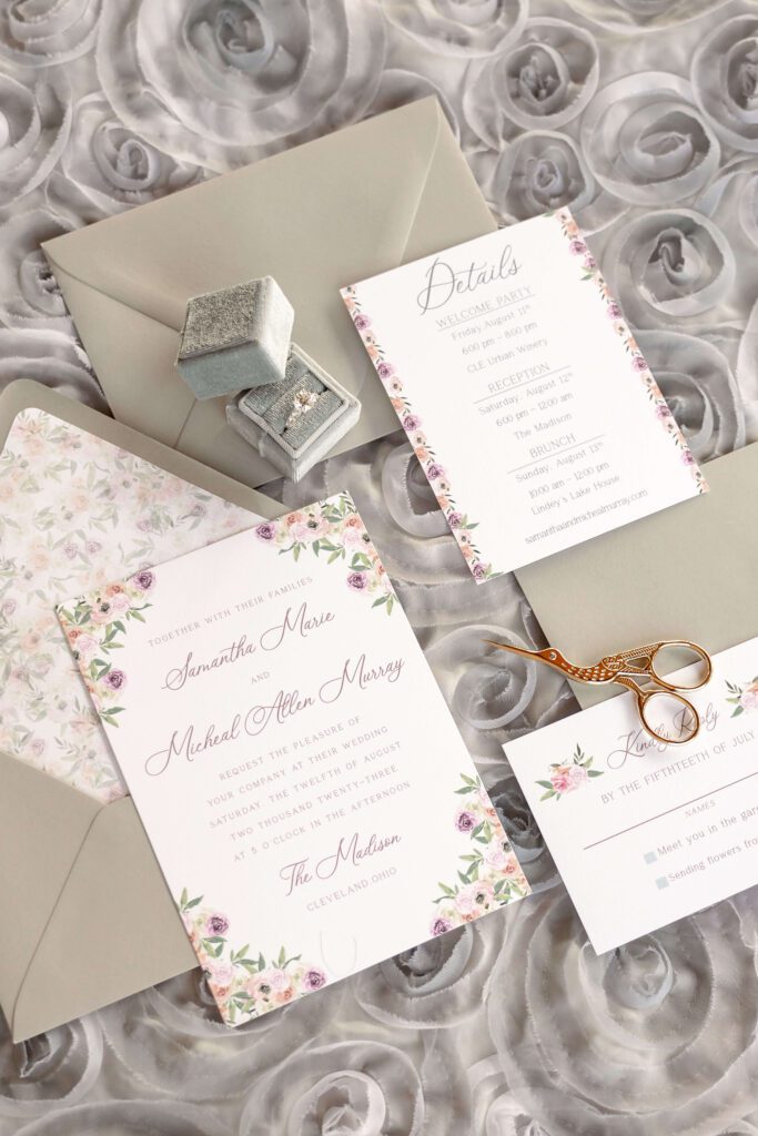 Elegant custom wedding invitation suite with floral watercolor art and a custom envelope liner