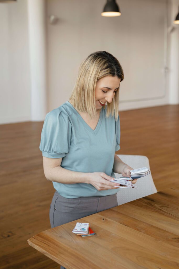 Wedding stationery designer Designs by Mecca choosing between color swatches