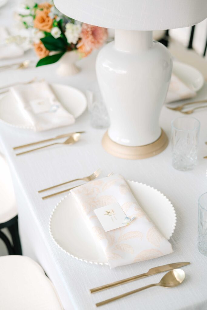Tablescape with place card featuring watercolor floral artwork