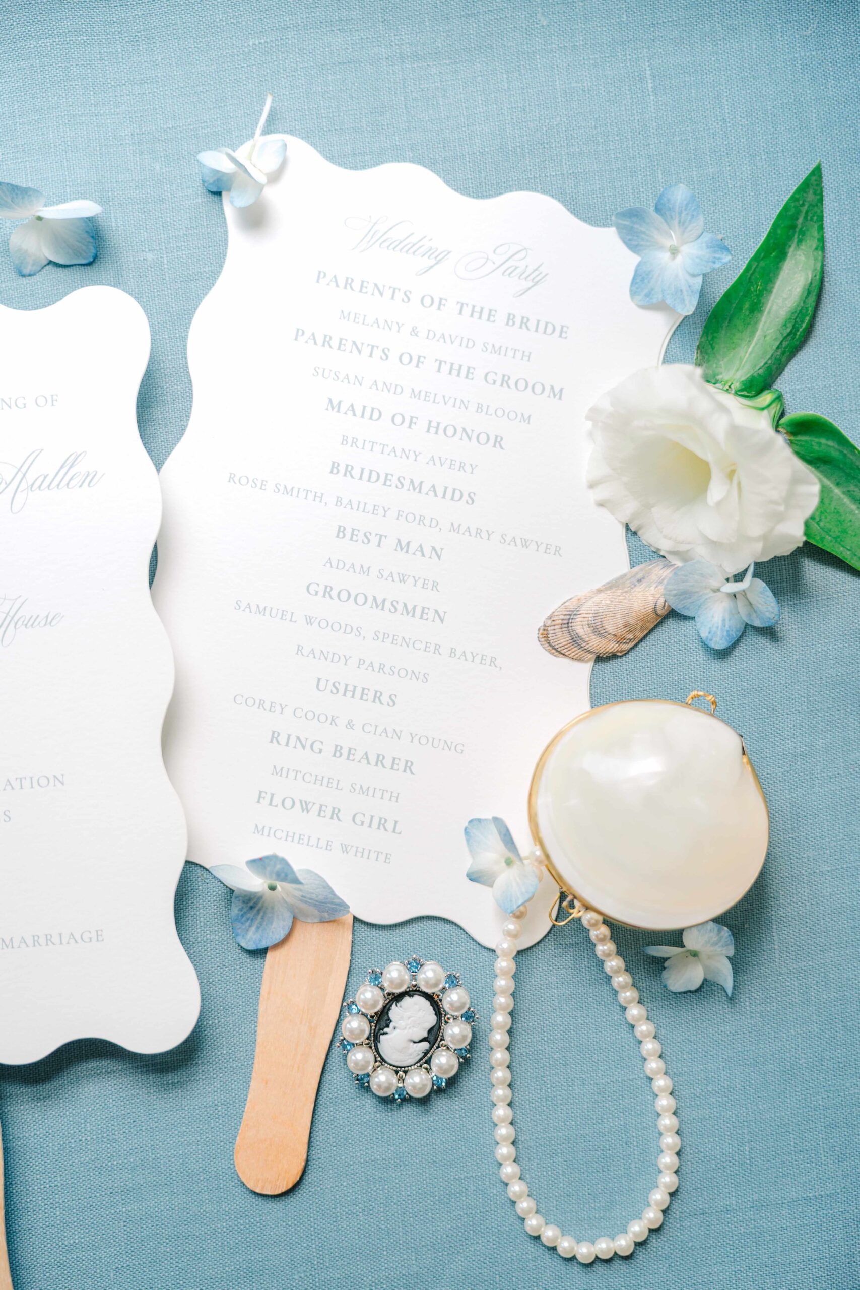 Wedding ceremony program fan with scalloped edges