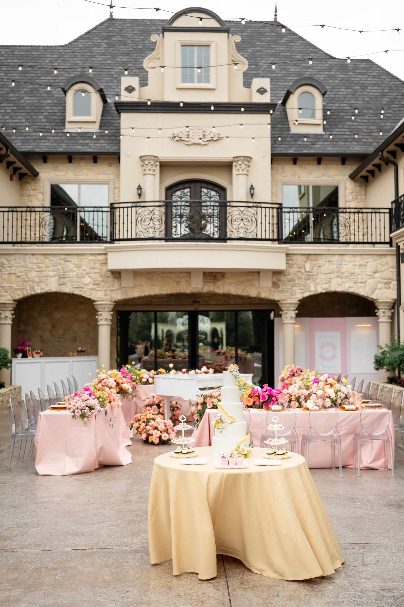 Vibrant garden party wedding in the courtyard at Knotting Hill Place