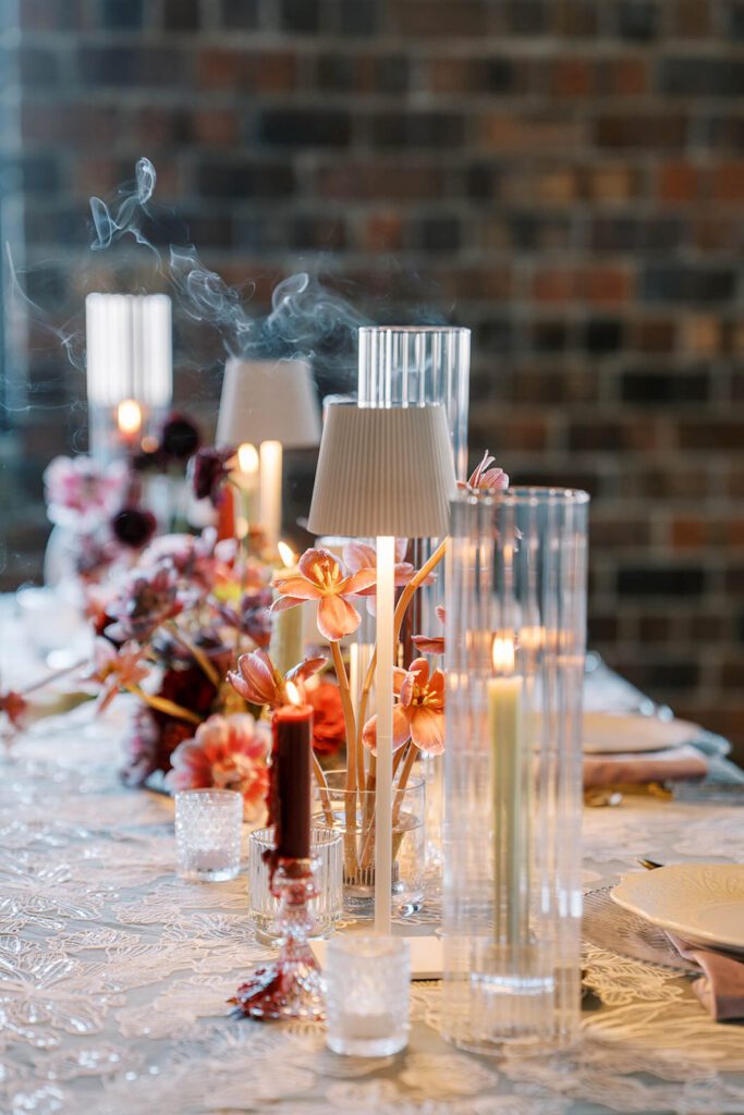 Moody candlelit wedding reception table