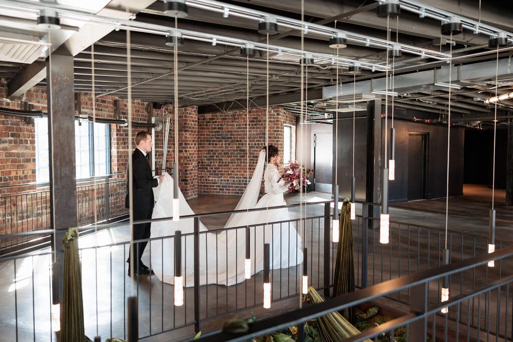 Bride and groom going to their wedding reception at Post 4 North 4th Corridor