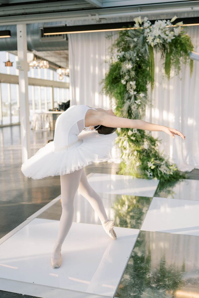 Elegant ballerina dancing at Revery North 4th Corridor