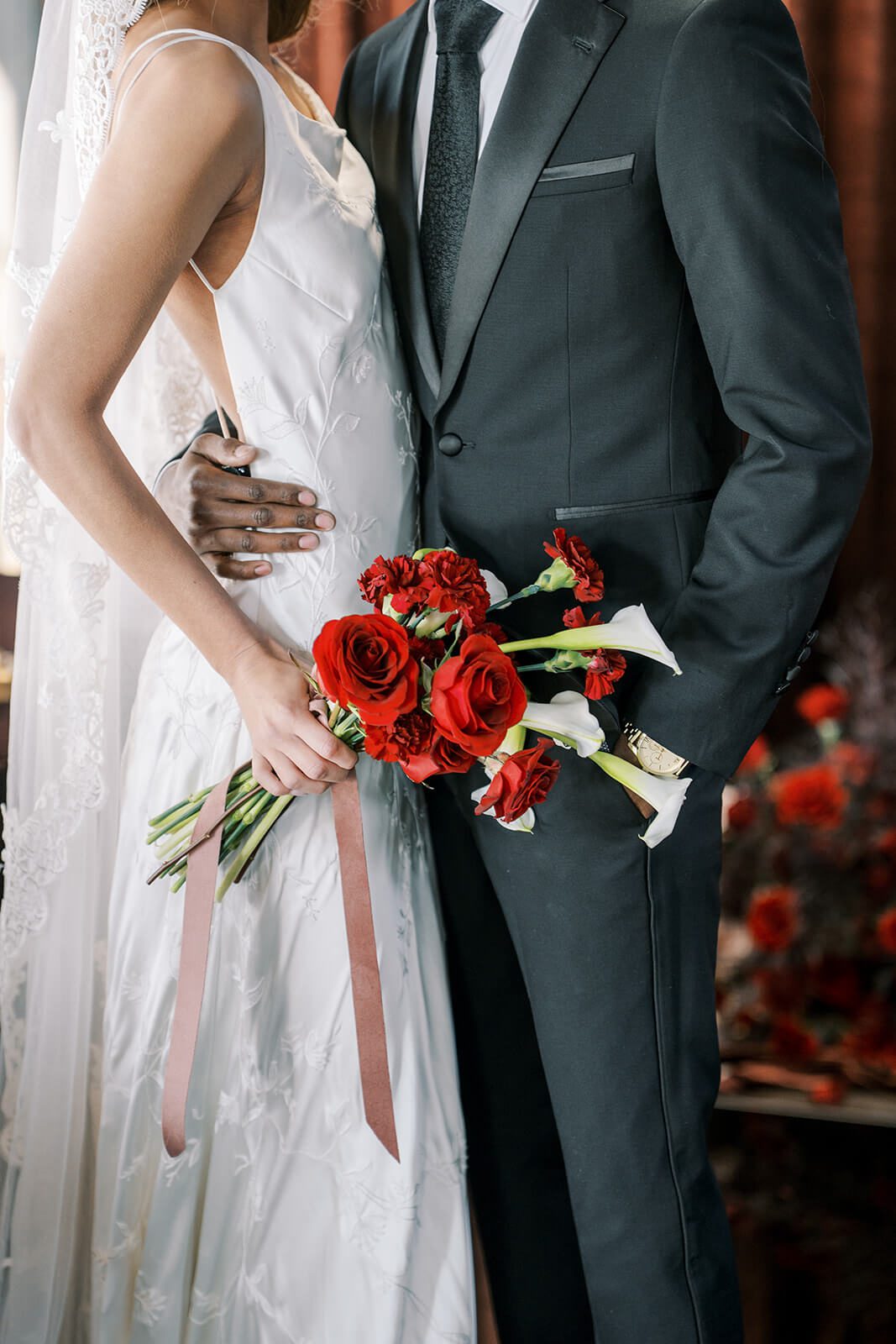 Portrait of bride and groom dress and tux