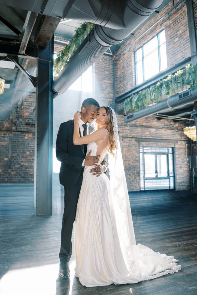 Bride and groom in industrial-chic wedding venue Brick and Mortar Columbus