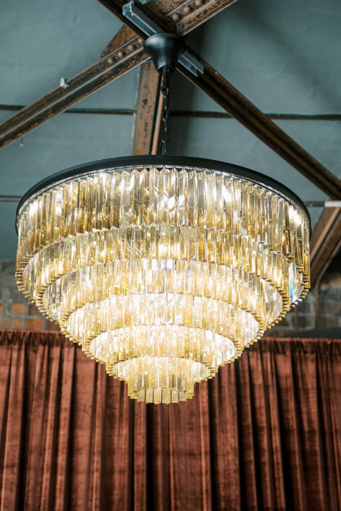 Luxurious chandelier hanging at Brick and Mortar Columbus