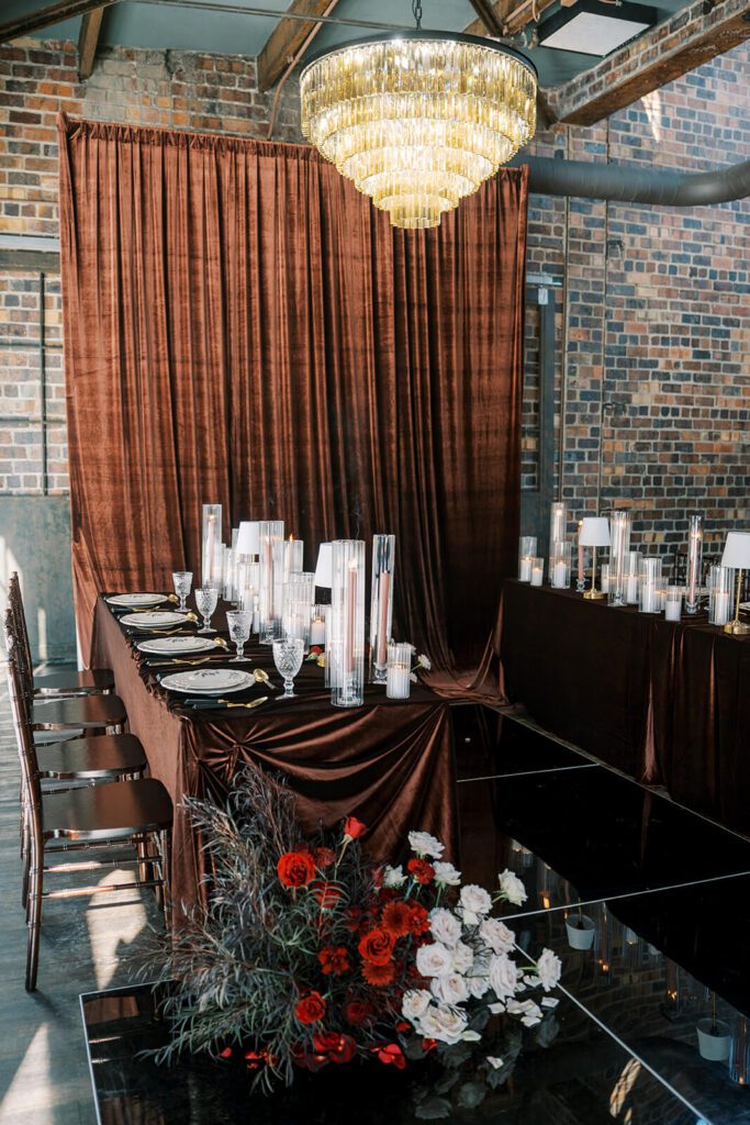Candlelit, velvet-draped wedding reception at Brick and Mortar Columbus