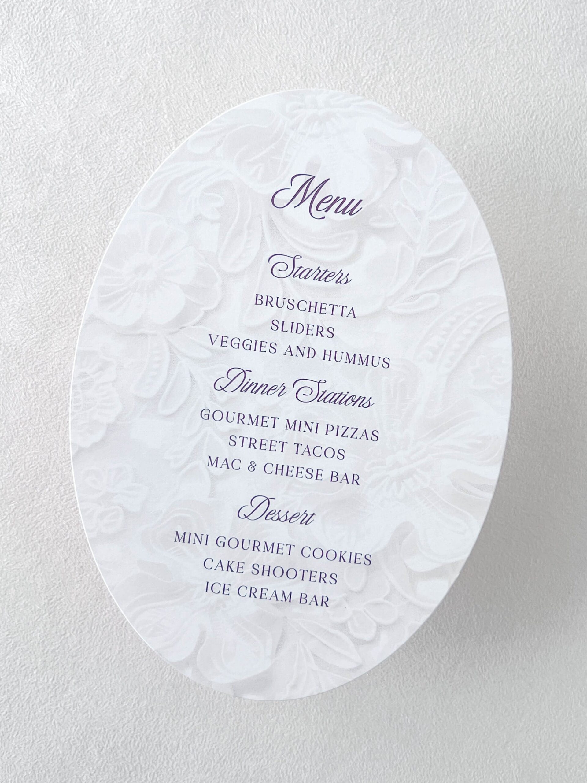 Oval wedding menu card with lace background