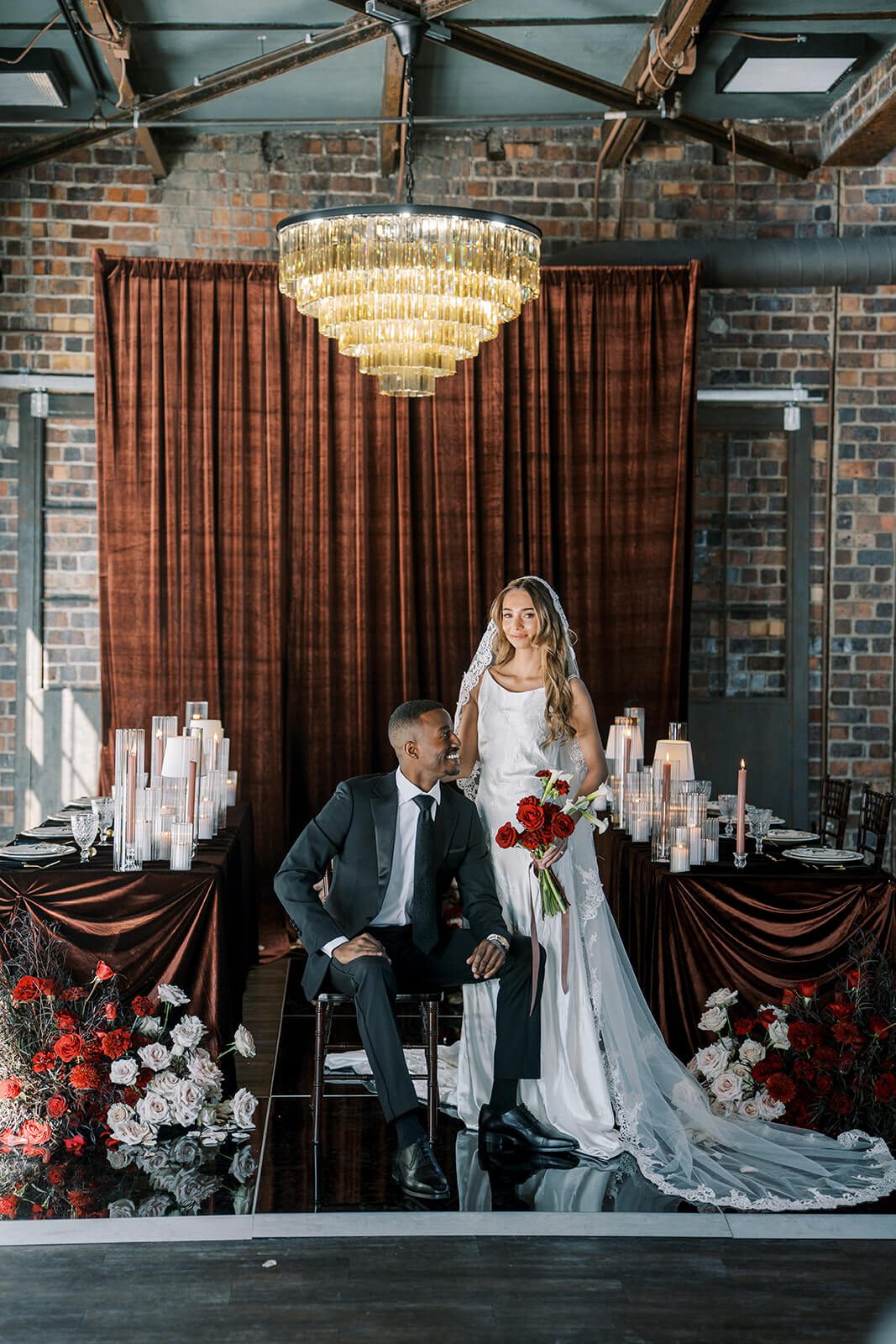 Velvet-draped luxe wedding reception setup at Brick and Mortar Columbus