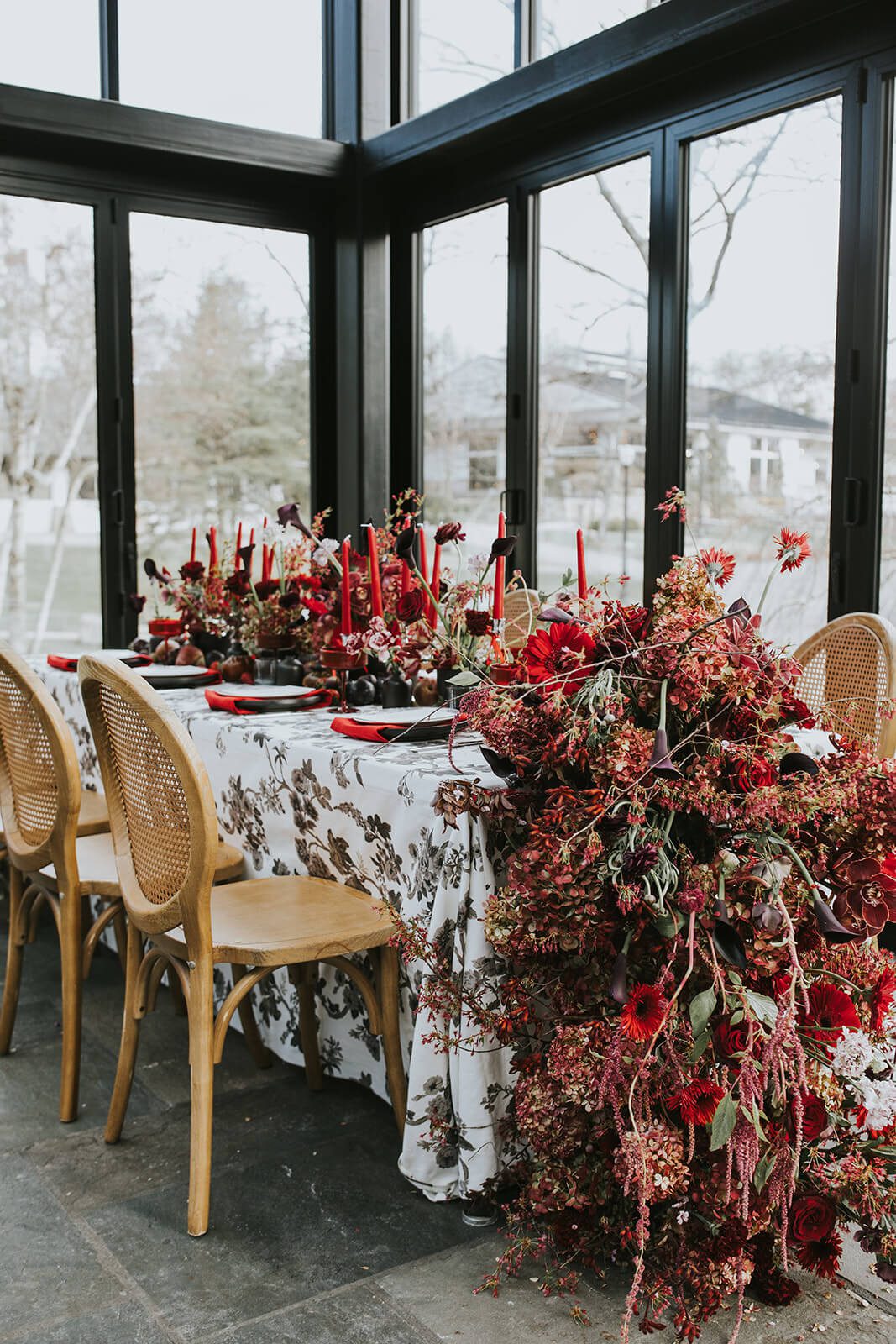 Cedar Lakes Estate wedding reception tablescape in shades of red