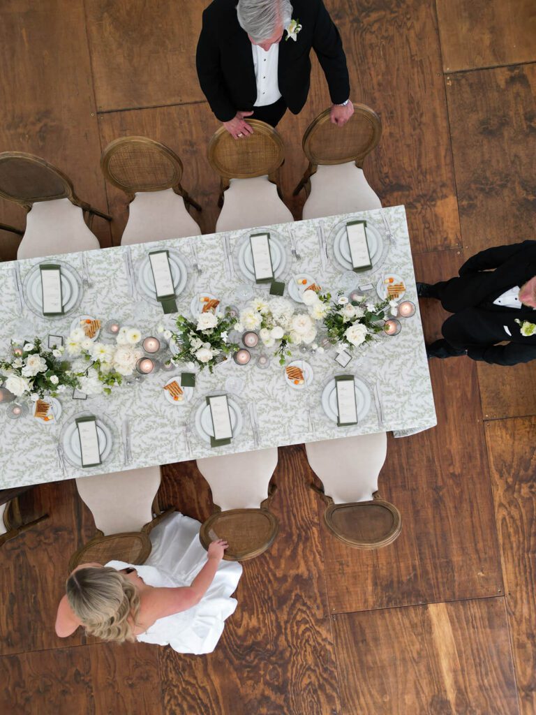 White and green wedding reception tablescape