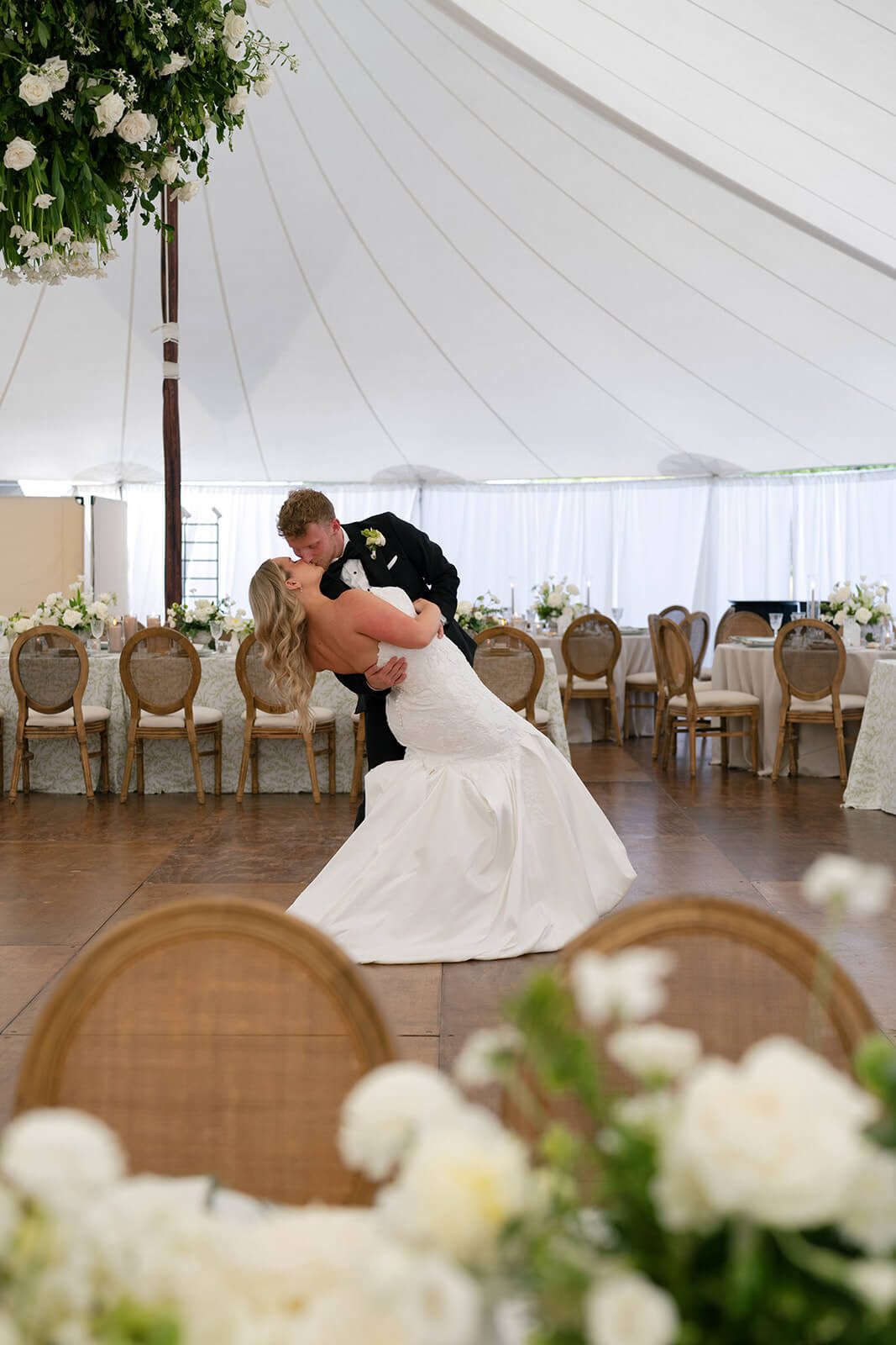 Bride and groom dancing in their tented wedding reception at The Montage Indianapolis