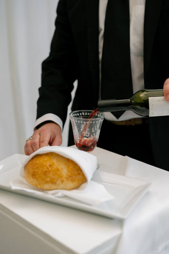 Man prepares a wedding ceremony communion