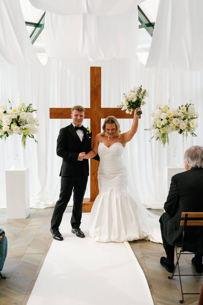 Bride and groom celebrating after their wedding ceremony at The Montage
