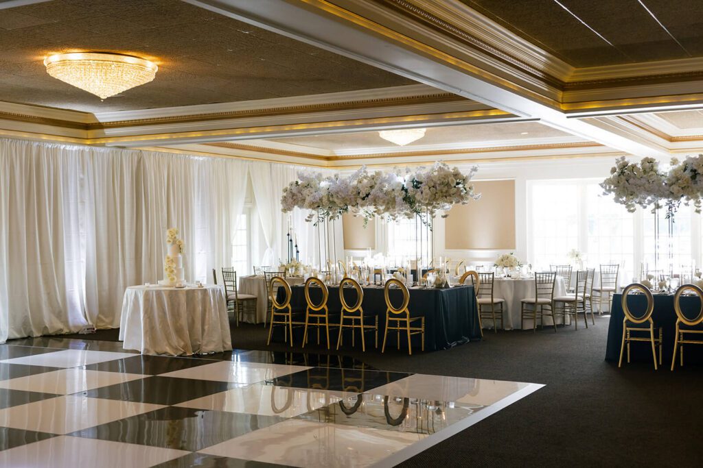 Elegant and timeless black and white wedding reception in The Grand Ballroom