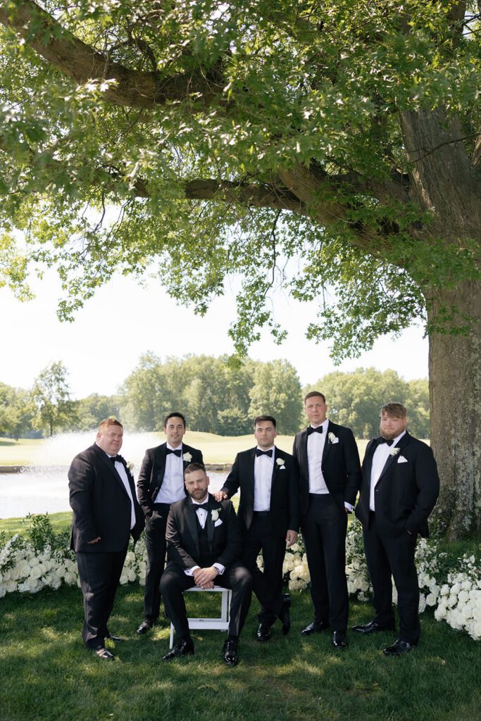 Portrait of groom with his groomsmen on the golf course at The Grand Resort Ohio