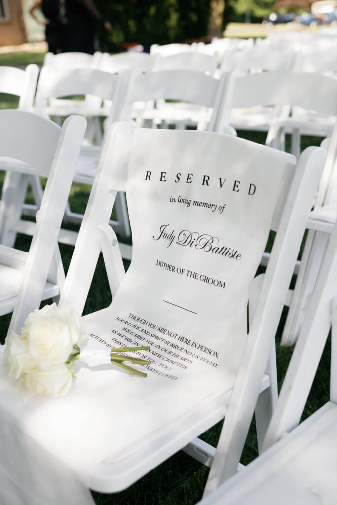 Wedding ceremony reserved chair with sign