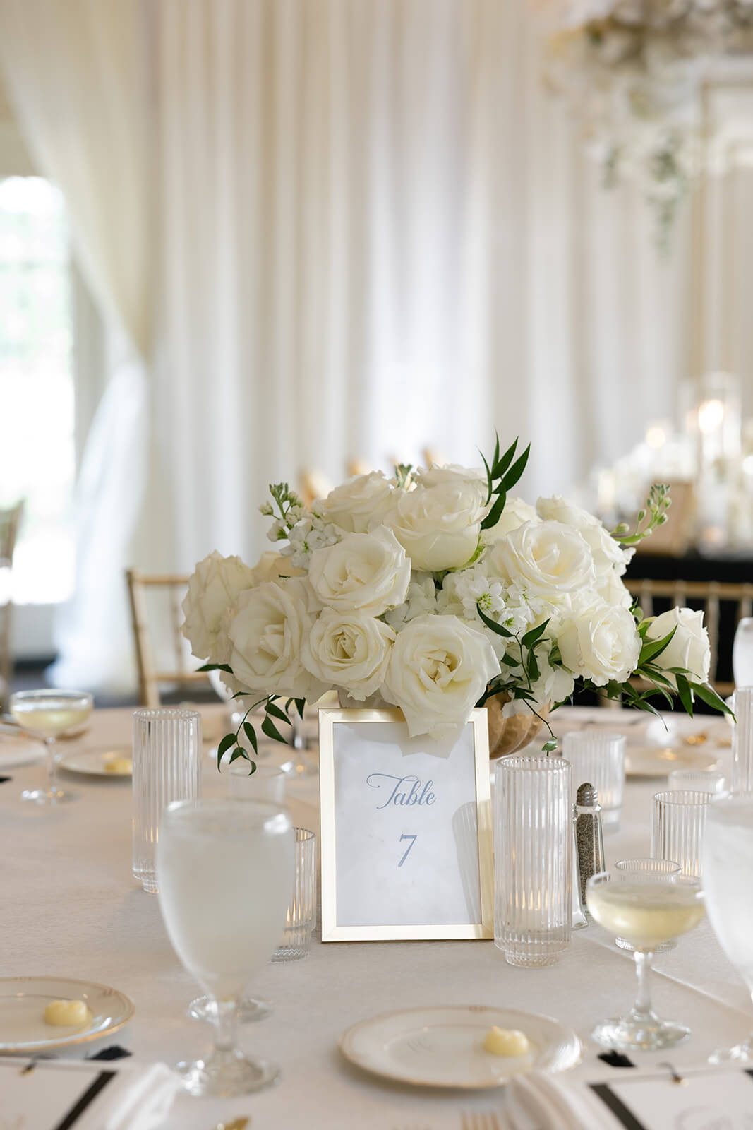 Wedding reception table number in a simple gold frame at a wedding at The Grand Resort Ohio